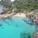 Apartahotel In With Swimming Pool In Cala Girgolu