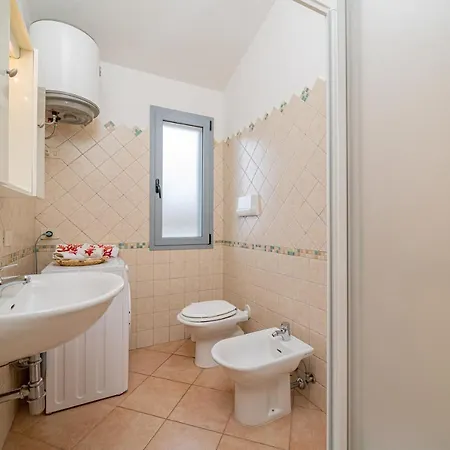 Апарт-отель In With Swimming Pool In Cala Girgolu *