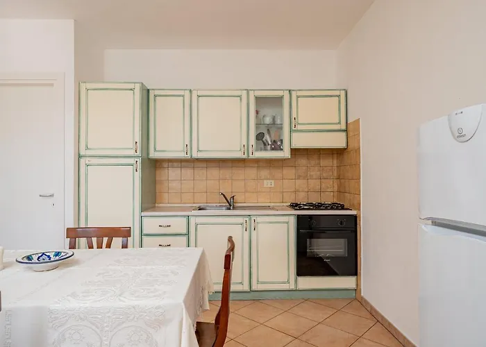 Apartmanhotel In With Swimming Pool In Cala Girgolu