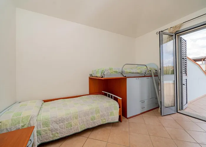 In With Swimming Pool In Cala Girgolu Apartmanhotel 3*